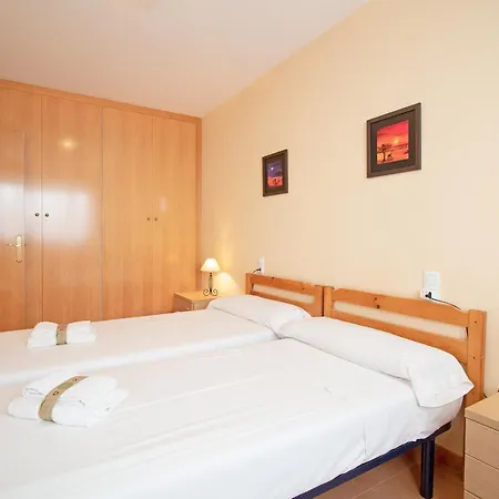 Global Properties, Practico En La Playa De Canet